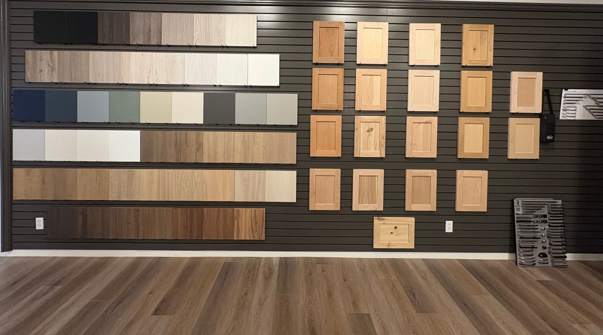 Sample wall showing Columbia Carpentry's range of door colours, styles, and wood species